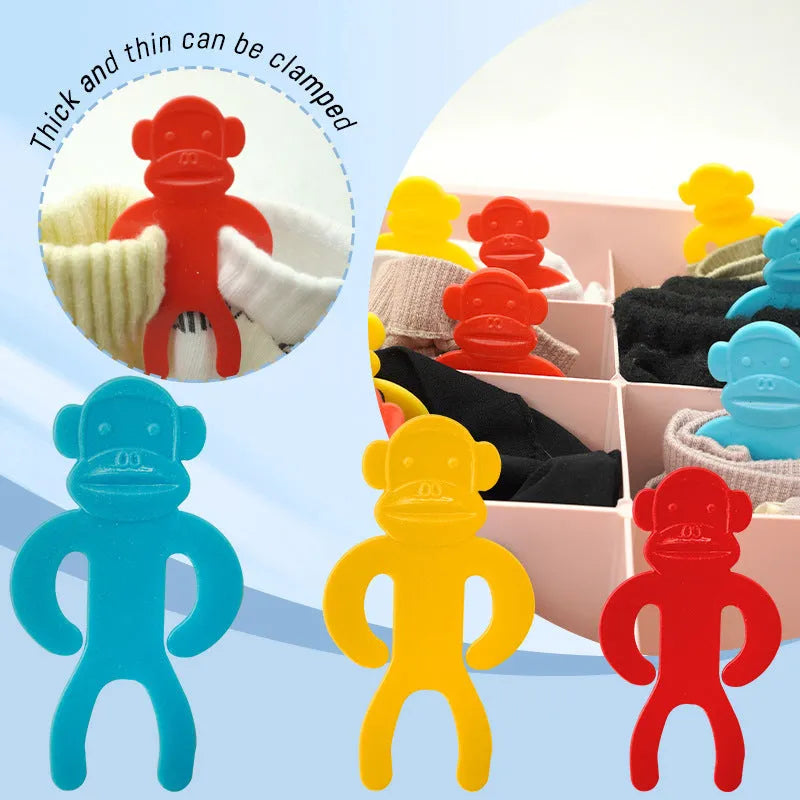 Plastic anti-winding socks storage clips in blue, red and yellow colours for machine washing