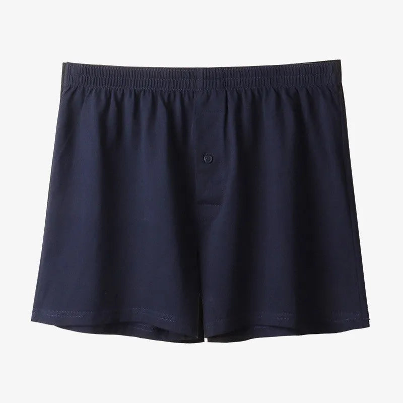 Men's solid colour cotton boxer shorts with a high waistband and loose leg.