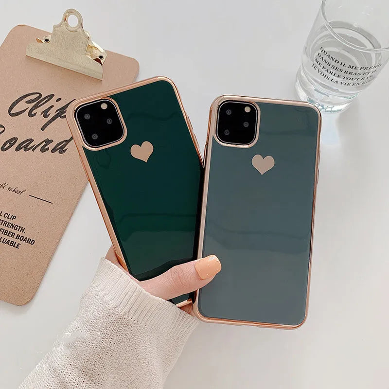 Slim solid colour TPU back cover case for iPhone on a table.
