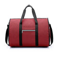 Black cylinder-shaped travel bag with a zipper opening, made from Oxford cloth, showing its medium size.