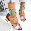Women's beige suede sandals with fish mouth toe, thick heel, and front ankle strap.