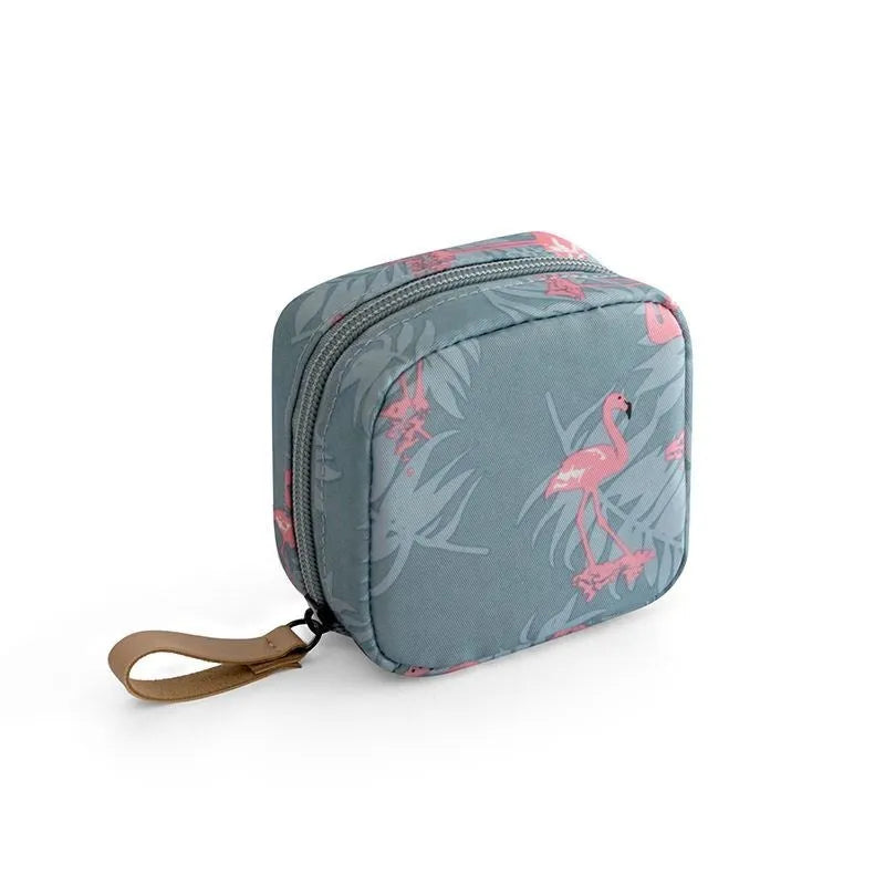 Cloth cube makeup storage bag organiser in a plain pattern, shown in blue, pink, white, and white pink colours.