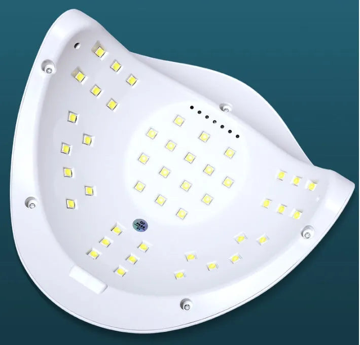 White nail polish drying lamp with dual UV and LED light sources for gel polish curing