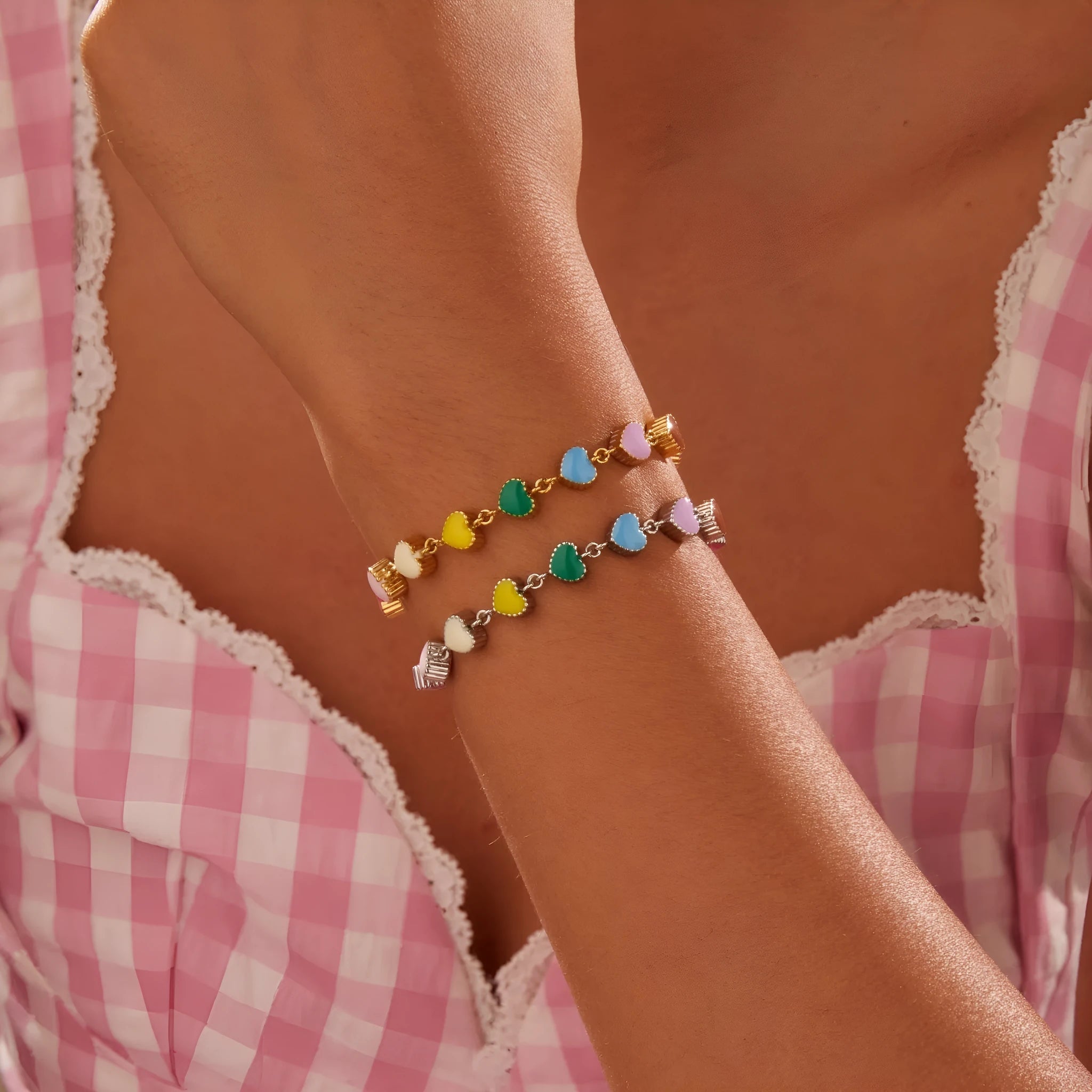 Gold plated women's bracelet with love heart pendant on titanium steel chain