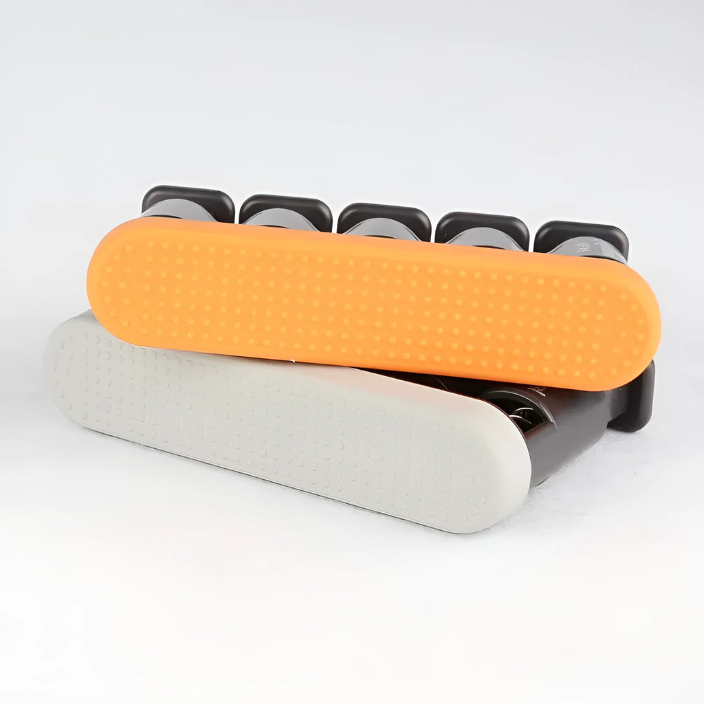 Grey and orange non-slip silicone finger trainer for musician hand strength development.