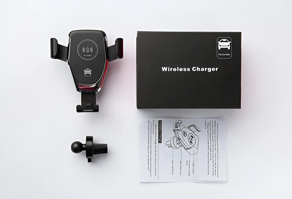 Black Qi wireless car charger mounted on a car dashboard, holding an iPhone.