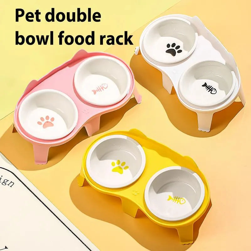 Blue ceramic cat food and water bowls on a white elevated stand with a storage hook.