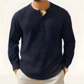 Slim fit long sleeve shirt in linen blend fabric with 3/4 sleeves and round neck, shown in army green.