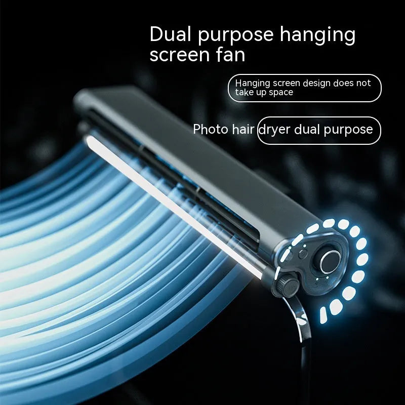 Black USB-powered bladeless clip-on laptop fan with integrated lighting lamp attached to computer screen