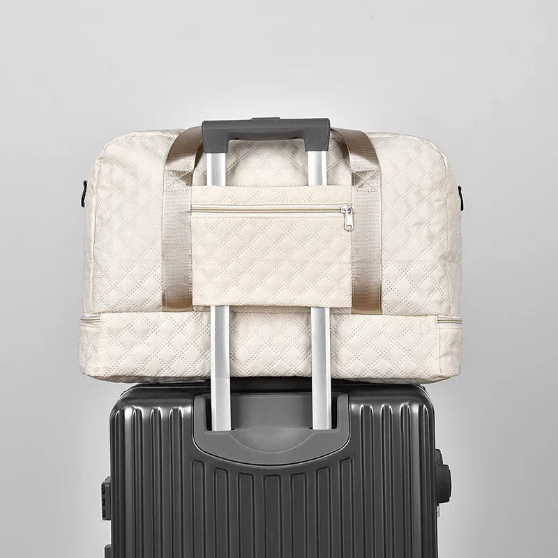 Oxford cloth leisure travel bag in a solid colour with a 36-55 litre capacity.
