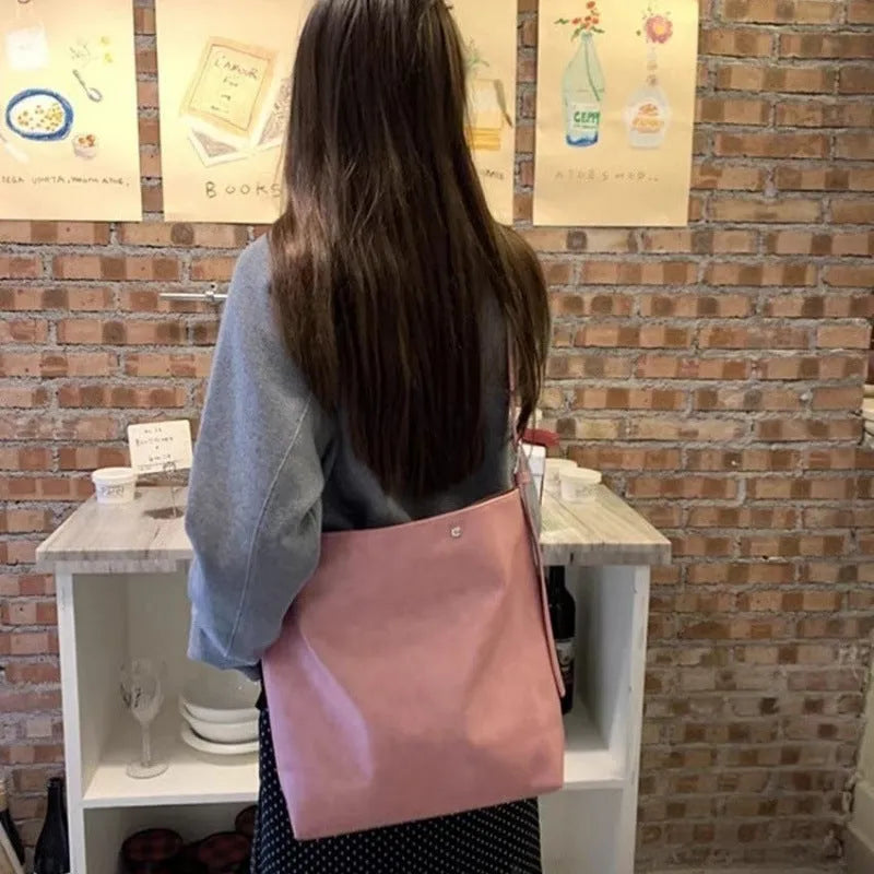 Corduroy one-shoulder commuter bag in pink or brown colour with PU lining