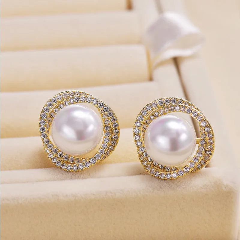 Diamond rose pearl stud earrings in white gold colour with rhinestone inlay on copper base