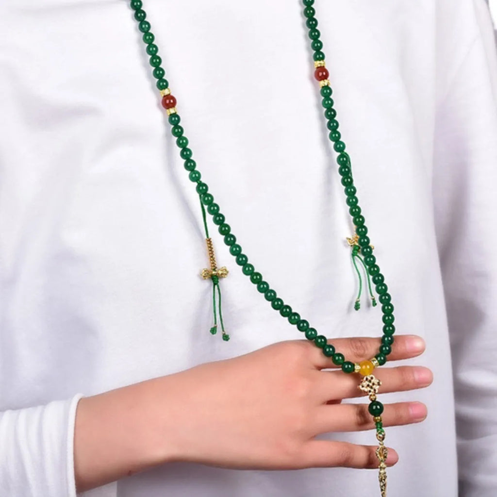 Handcrafted multi-strand bracelet with green agate beads from Brazil, showing size options.