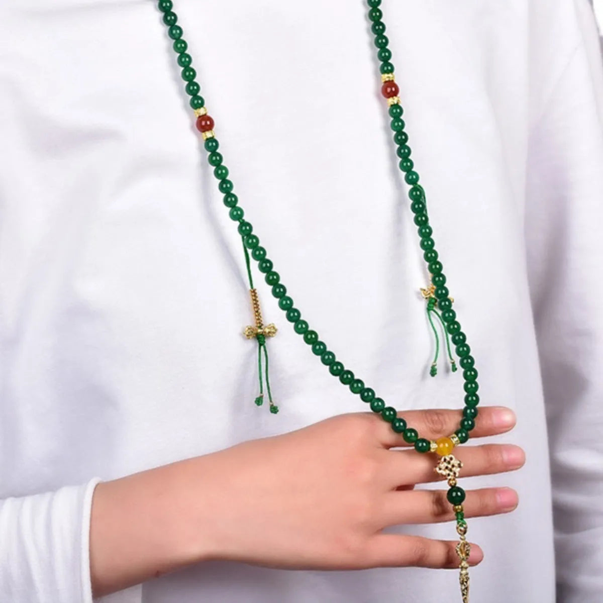 Handcrafted multi-strand bracelet with green agate beads from Brazil, showing size options.