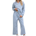 Women's solid colour knitted suit set with lapel top and cropped trousers in gray.