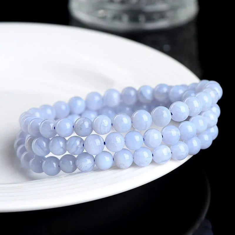 Blue agate bracelet with multi-circle stripe pattern and 6-6.8mm beads
