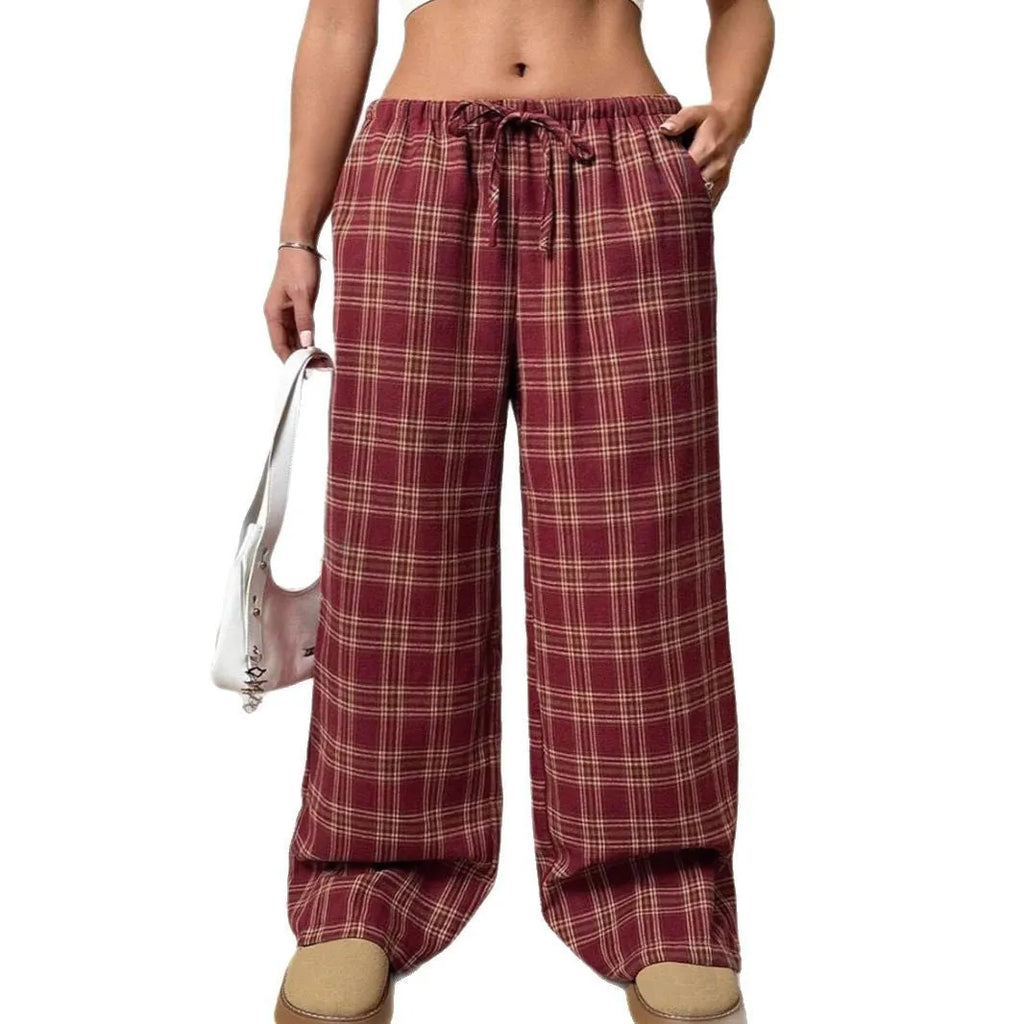 Women's loose fit plaid trousers with drawstring waist and side pockets in red colour