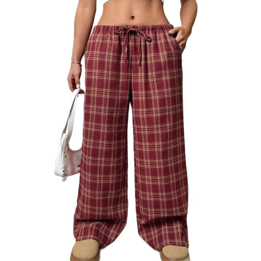 Women's loose fit plaid trousers with drawstring waist and side pockets in red colour