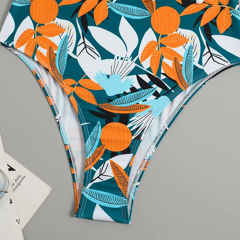 Women's high waist one-piece swimsuit in printed pattern, available in black or white.