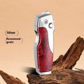 Zinc alloy folding lighter tool with integrated pocket knife blade, shown in a selection of wood grain and carbon fibre finishes.
