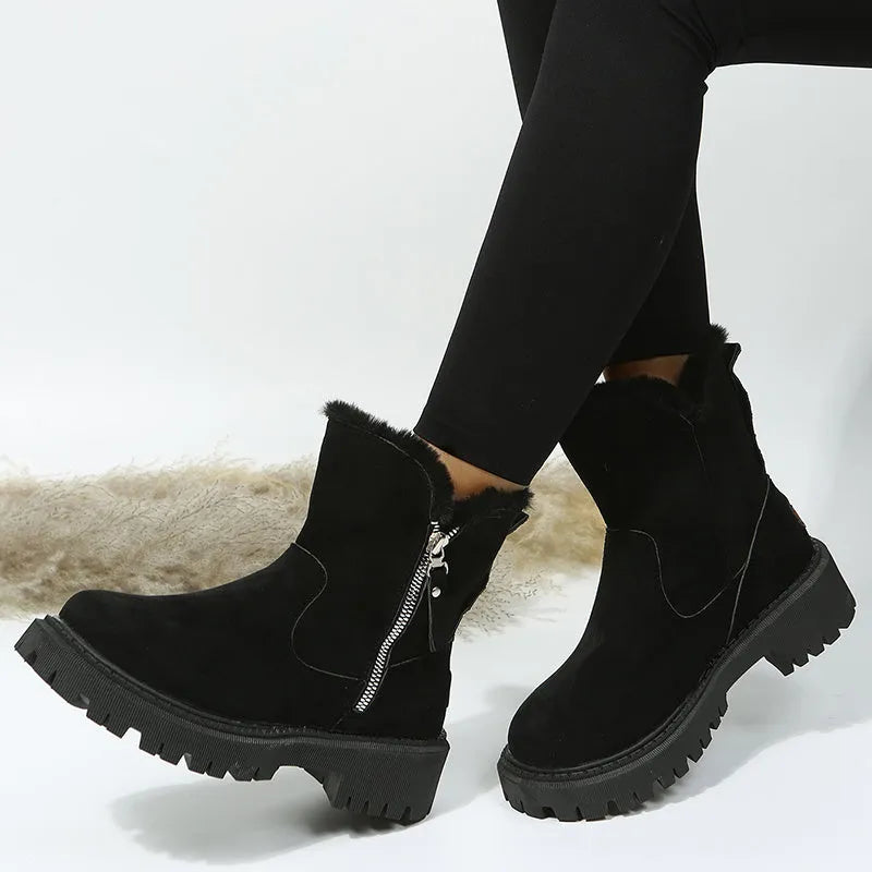 Women's black thick plush snow boots with side zipper and high top design.