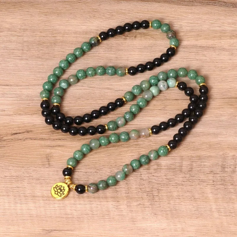 Green and black alloy elastic beaded bracelet with natural style on wrist