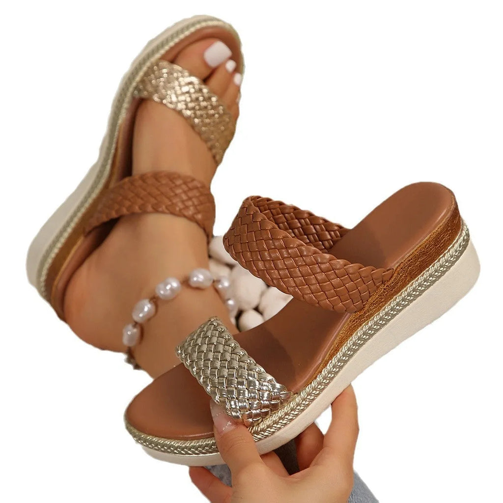 Women's metallic gold wedge sandals with adjustable strap and rubber wedge sole