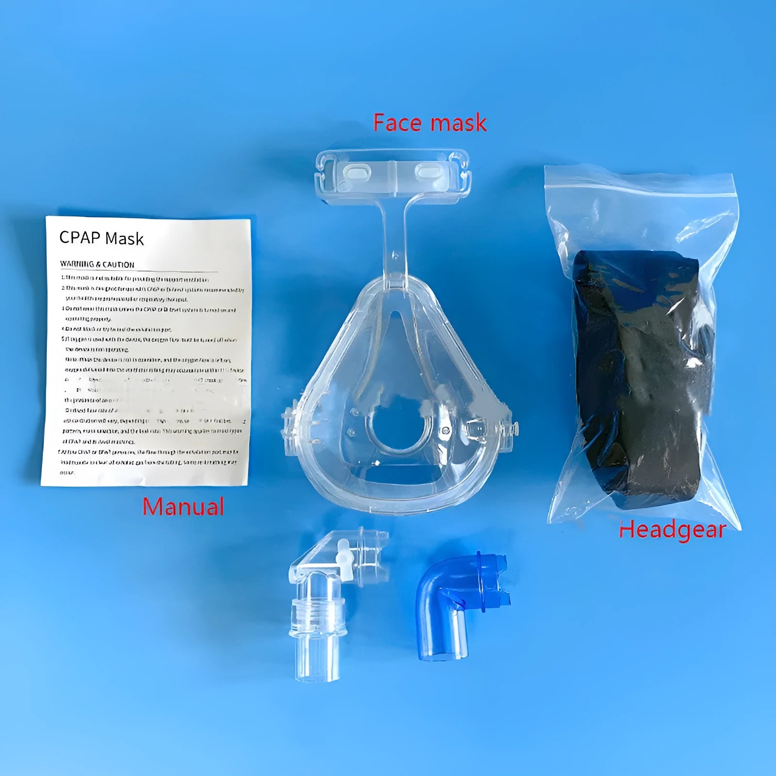 Transparent CPAP breathing mask with silicone cushion and two elbow adapters for ventilator connection