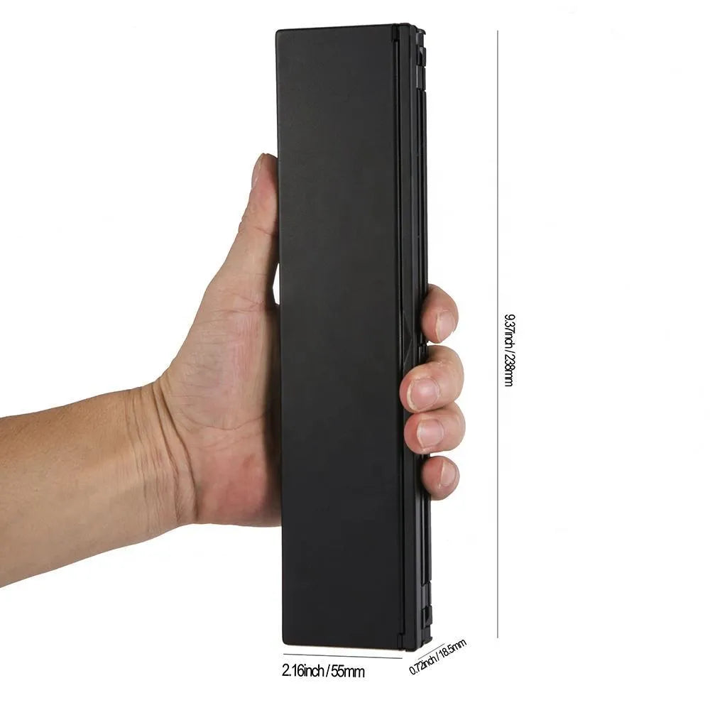 Black mini folding wireless Bluetooth keyboard for tablets with wrist support and aluminium bottom