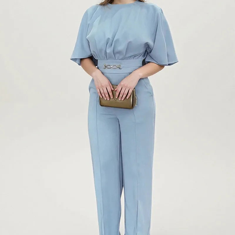 Blue men's two-piece casual suit with long sleeves and trousers on a model