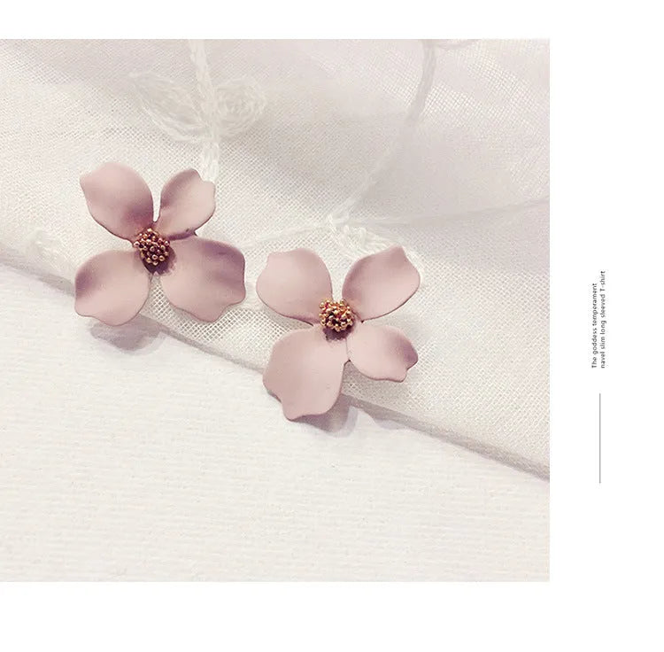 Flower shaped stud earrings for women in pink and white colours