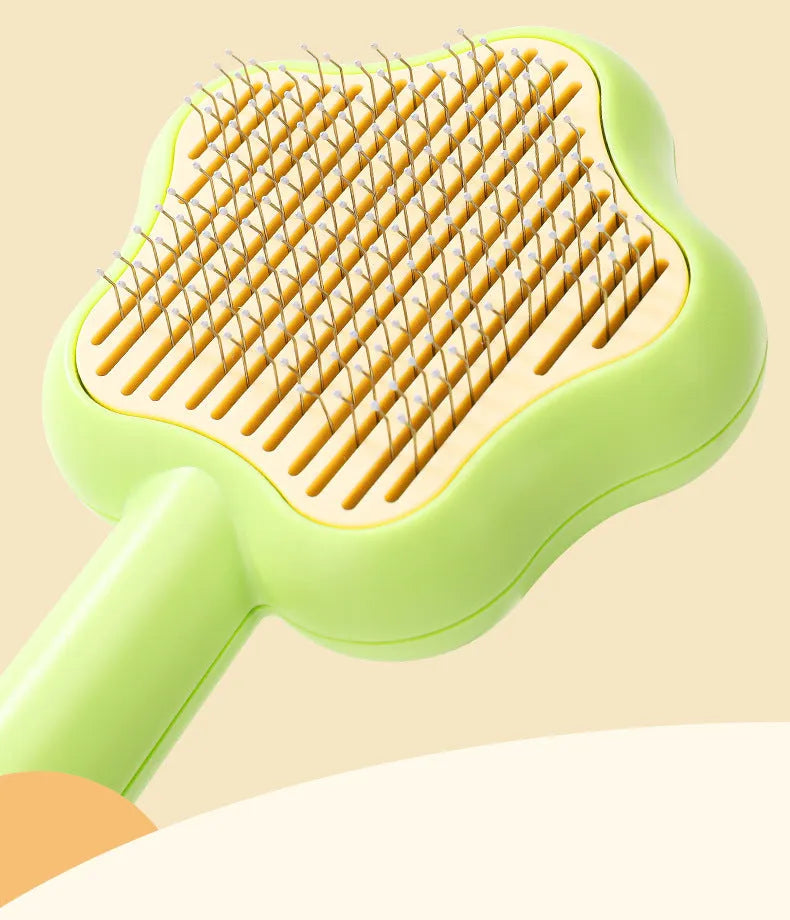Green self-cleaning cat comb magic wand with stainless steel needles for pet grooming