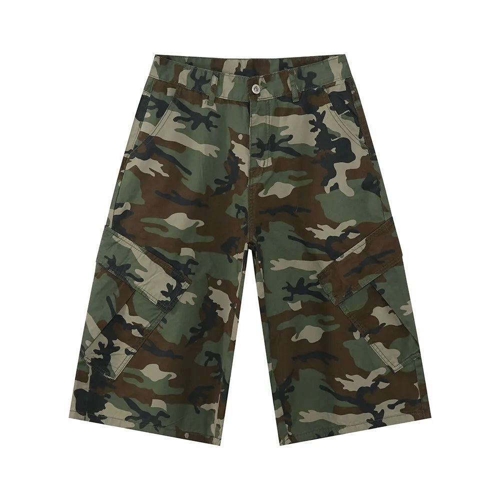 Men's green camouflage cotton trousers with wide loose legs, large side pockets, and cropped length