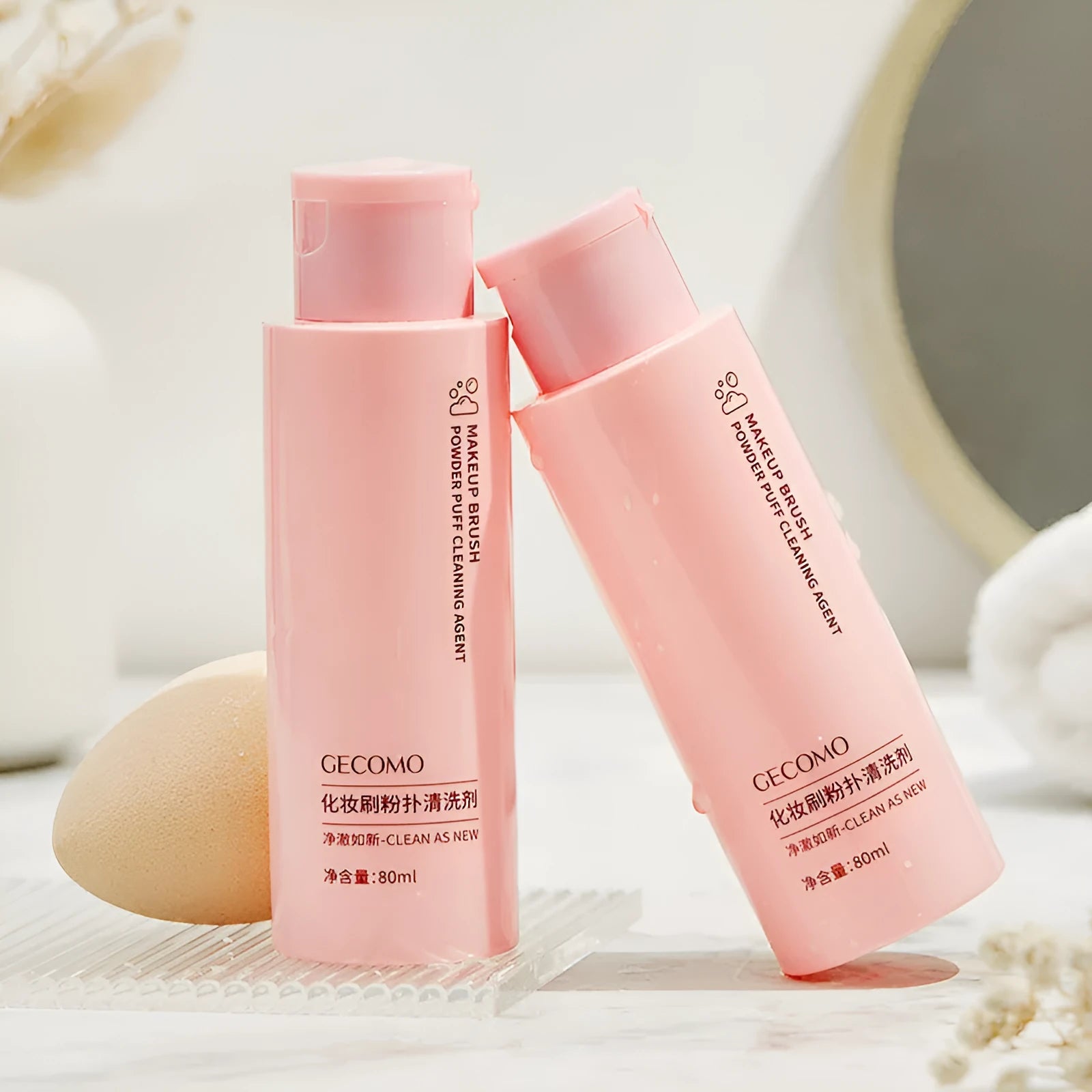 Makeup tool cleaning set showing 80ml detergent and 75ml wash-free spray bottles