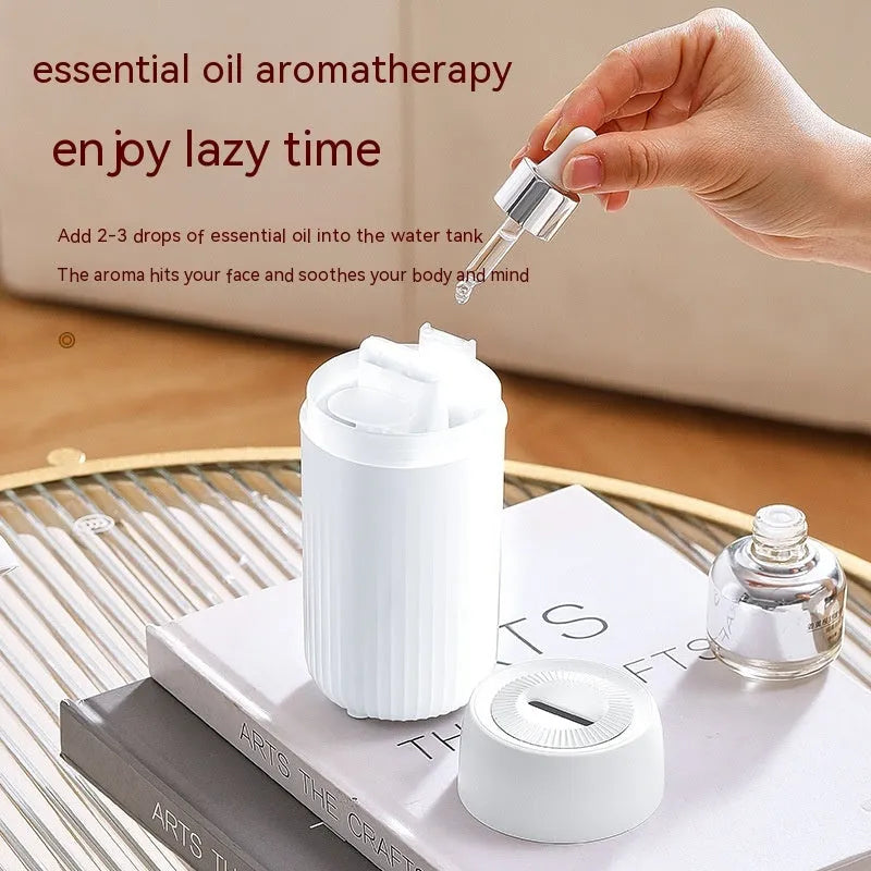 Car flame simulation aroma diffuser showing black and white colour options with 100mL capacity display