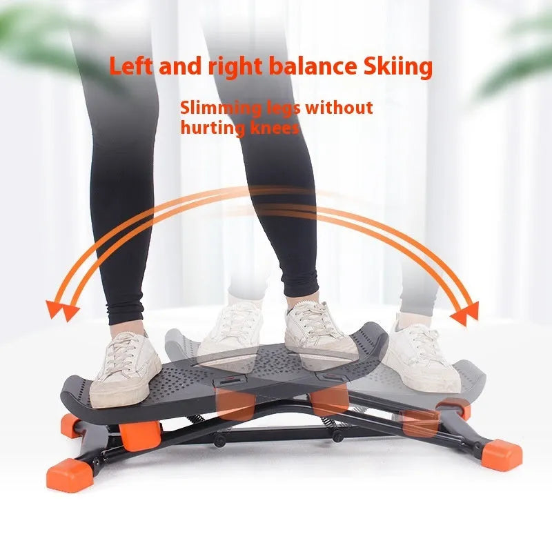 Black mini fitness skiing machine with elastic hand straps, compact home exercise equipment