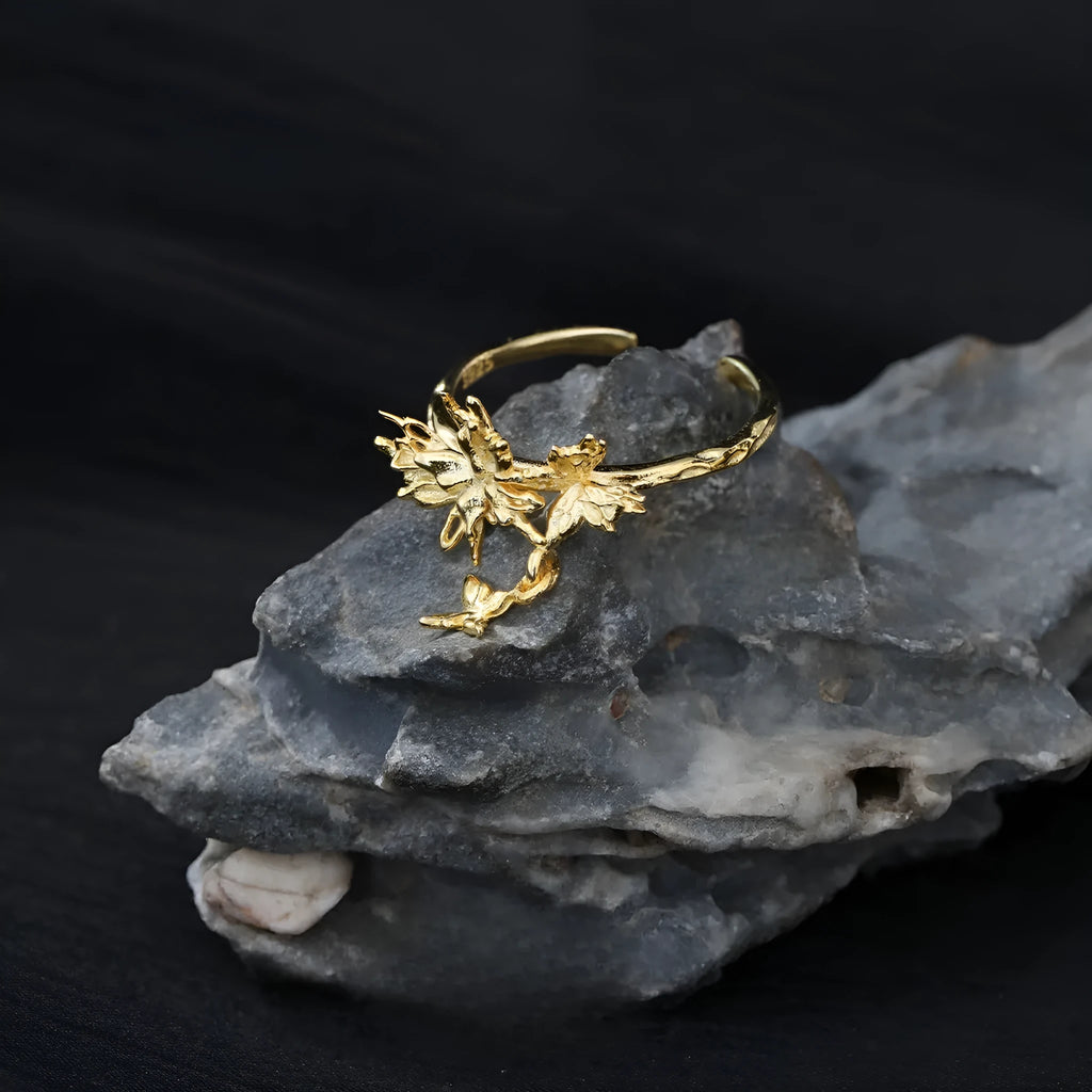 Adjustable silver butterfly ring showing electroplated finish in either white gold or 18K gold colour option.