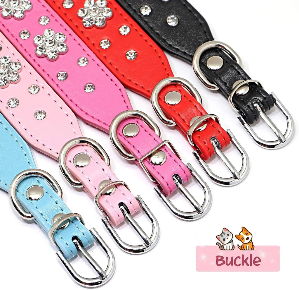 A pink PU leather dog collar studded with silver rhinestone flowers and a metal D-ring.