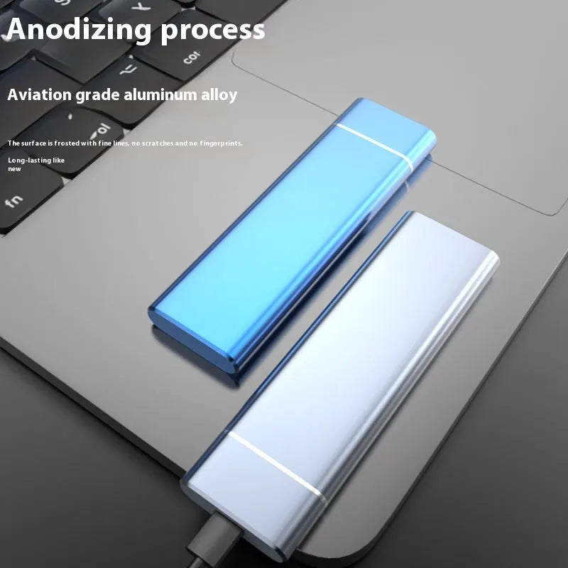 Sapphire blue portable external SSD drive with metal housing next to USB cable