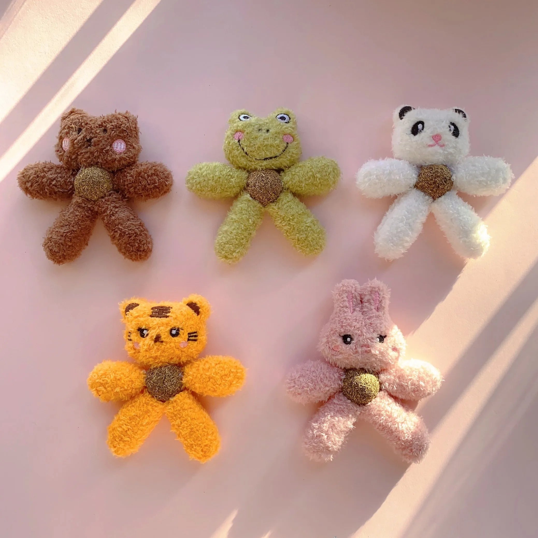 Edible catnip ball chewing toy in animal shapes for cleaning cat teeth.