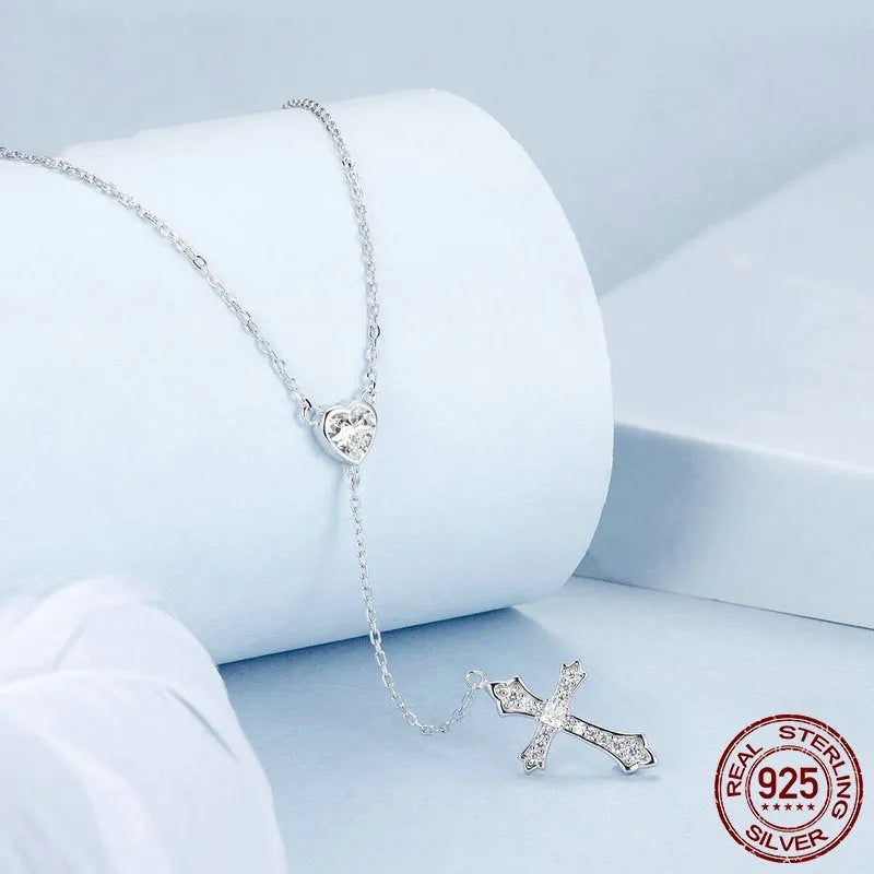 925 silver Love Cross pendant necklace with V-neck design and O-ring chain in BSN384 colour.