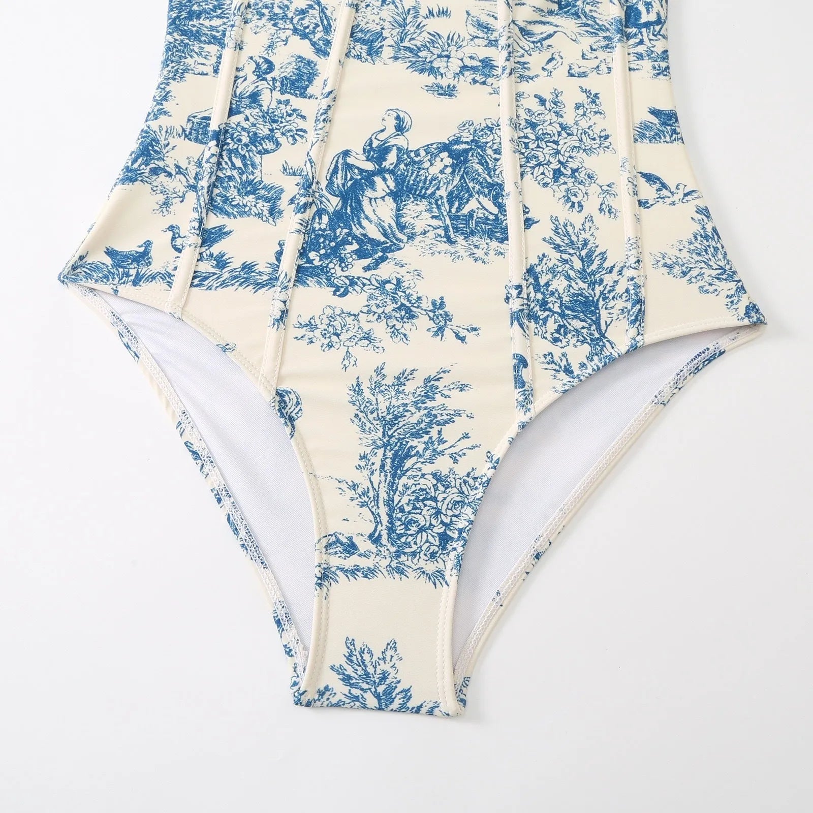 Blue one-piece swimsuit for women with an optional matching gauze skirt, shown in various sizes.