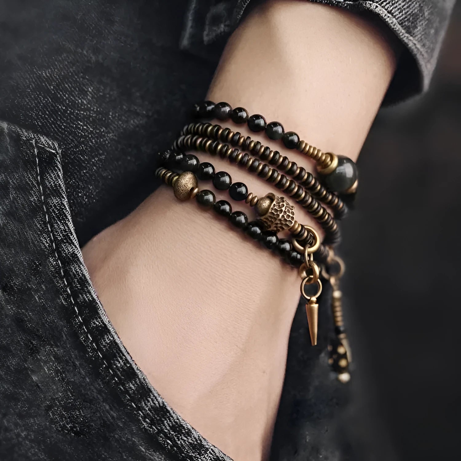 Geometric black beaded multi layered bracelet with natural styling elements