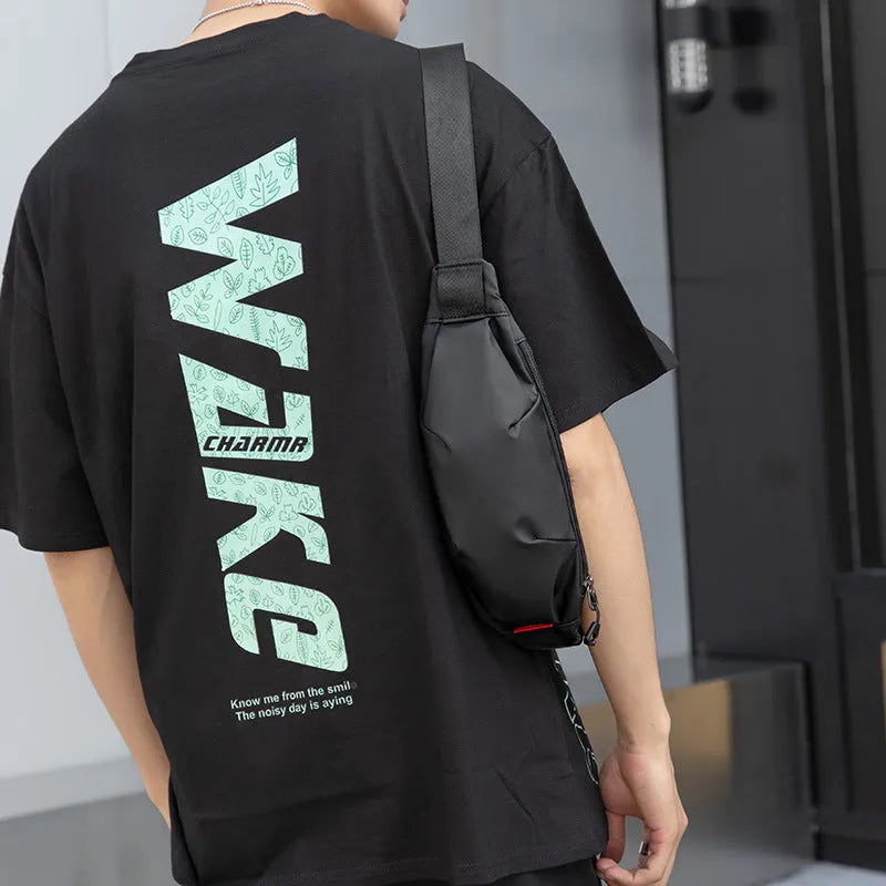 Black Oxford cloth men's waist pack with crossbody strap, showing internal phone and ID pockets.