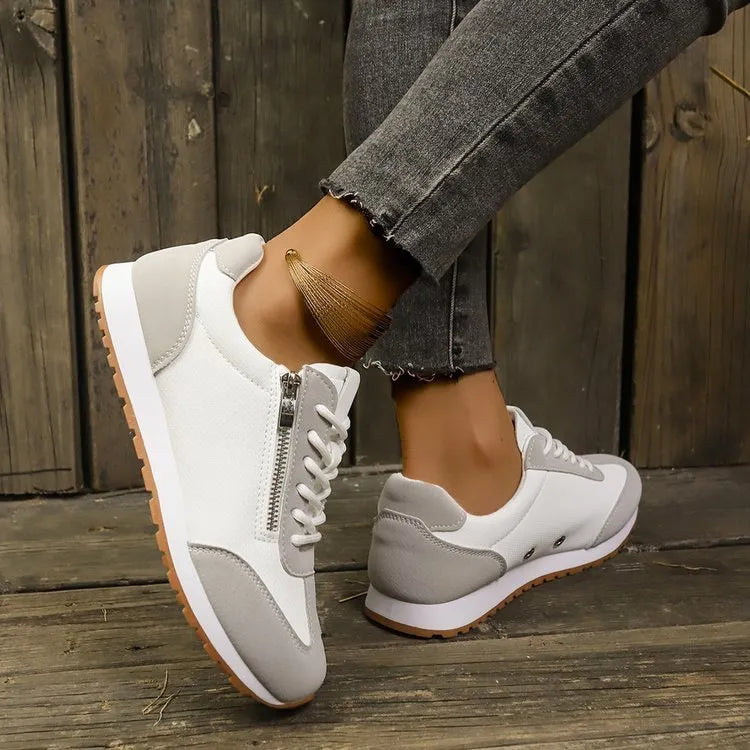 Women's flat shoes in champagne, grey and white with an artificial PU upper and rubber sole.