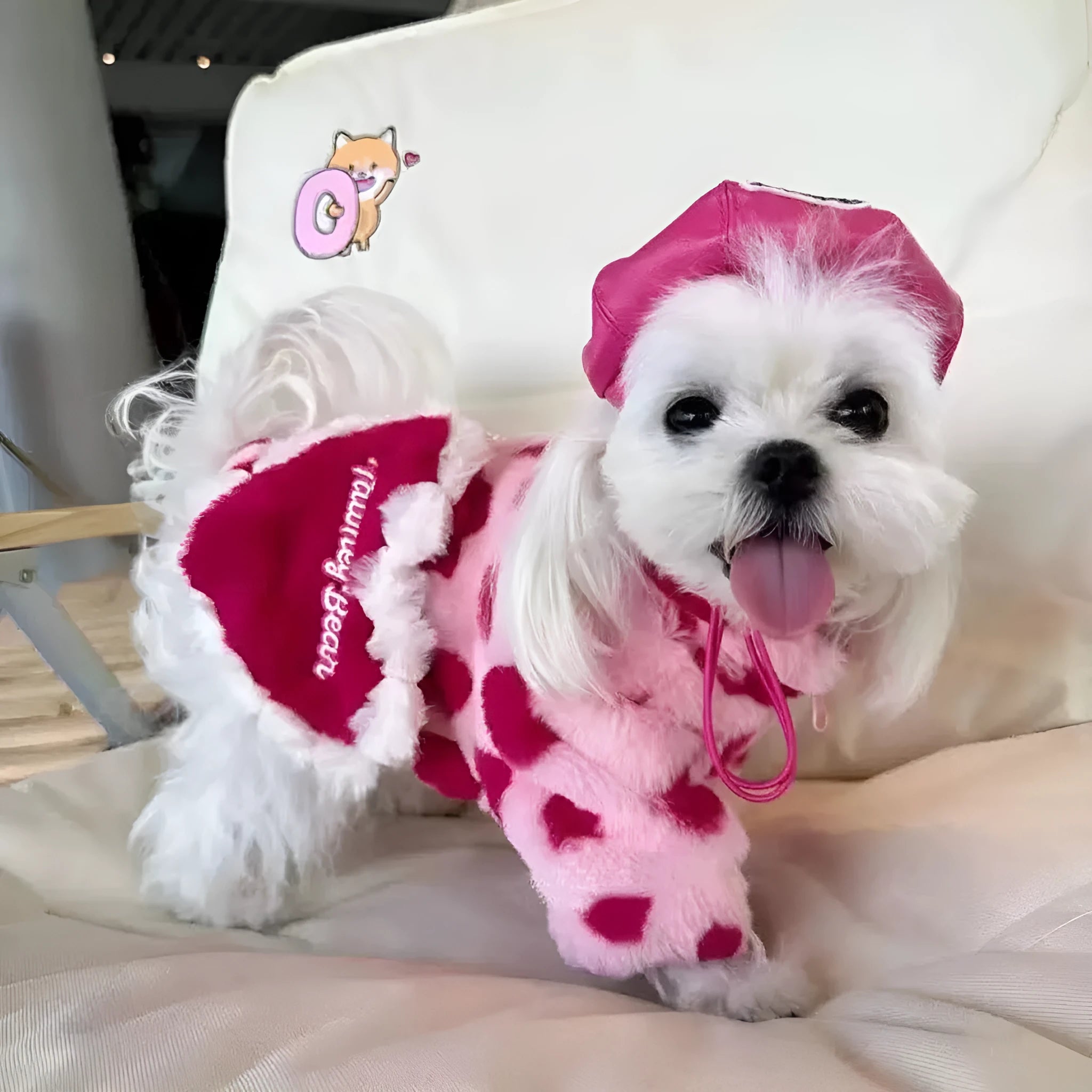 Small dog wearing plush polyester warm coat in pink colour, suitable for Teddy, Bichon and Pomeranian breeds