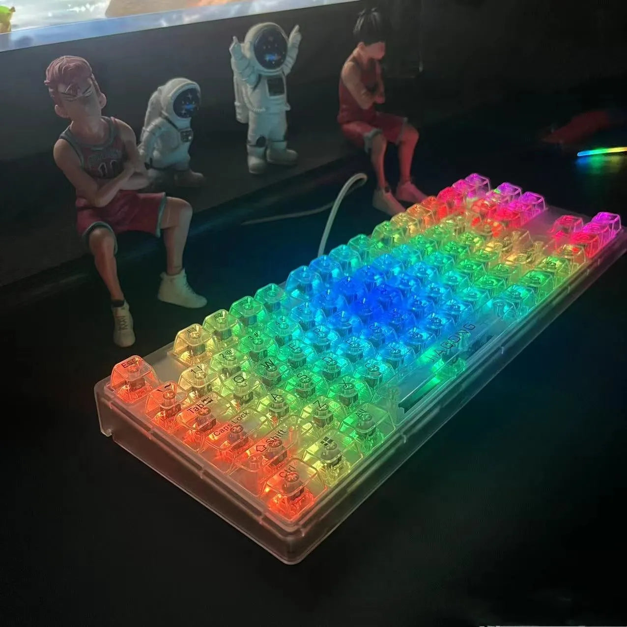 Universal transparent plastic 132-key mechanical keyboard key cap set laid out.