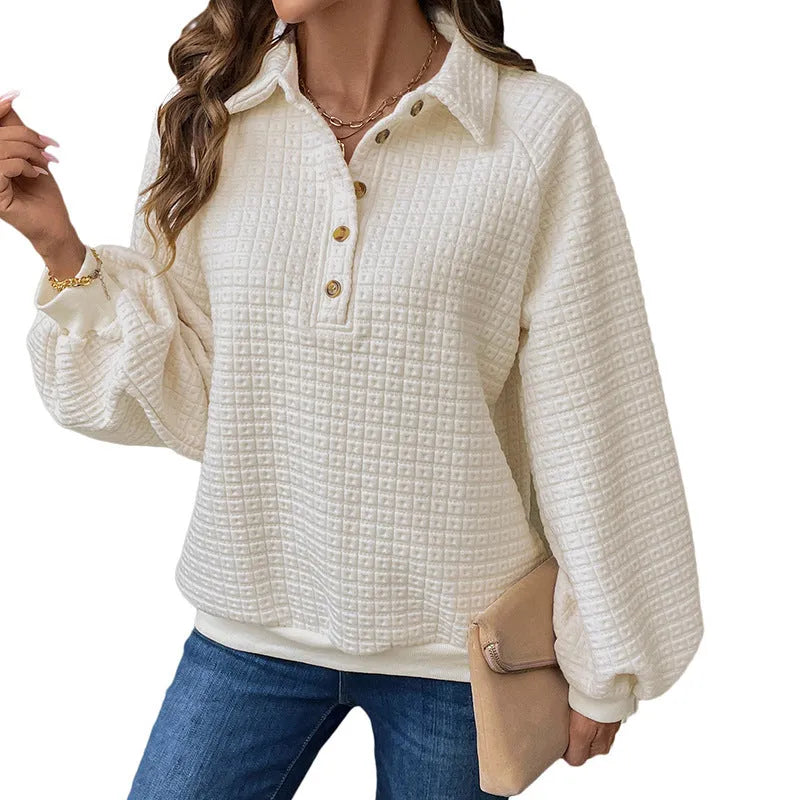Women's beige polo neck thick polyester sweater on a hanger