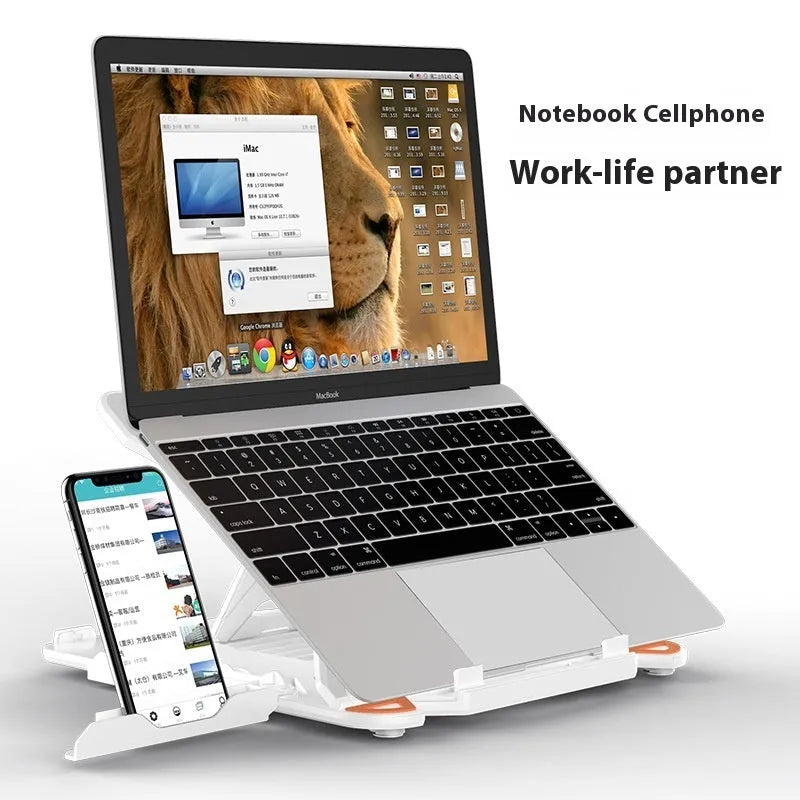 Black ABS plastic laptop bracket on a wooden desk next to a laptop.