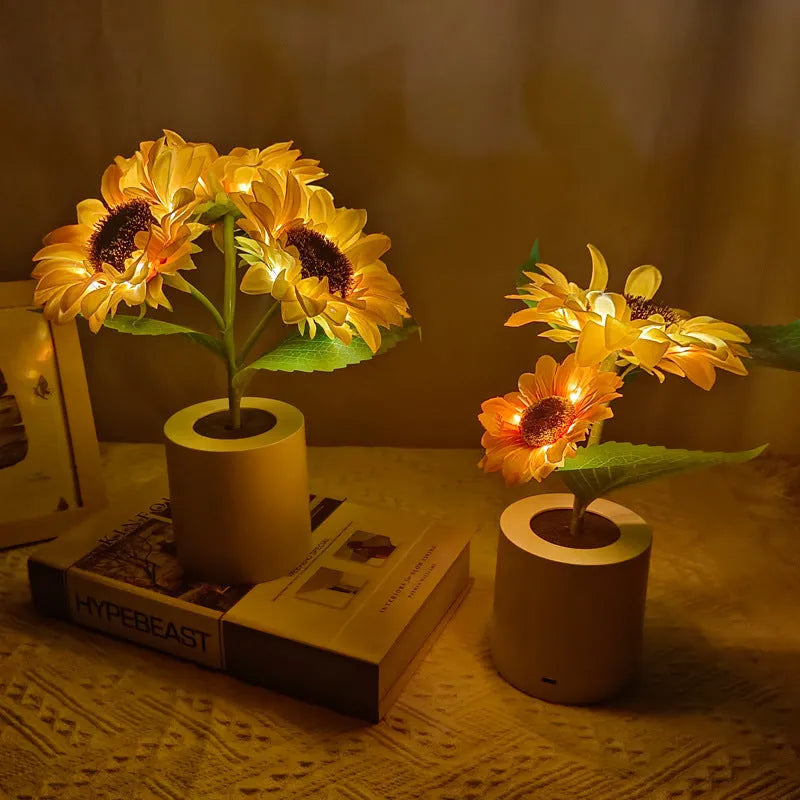 Rechargeable sunflower simulation LED night light table lamp with artificial flowers on a wooden table